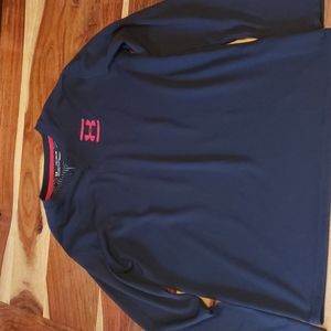 Under Armour Cold Gear.  Loose fit, size YXL